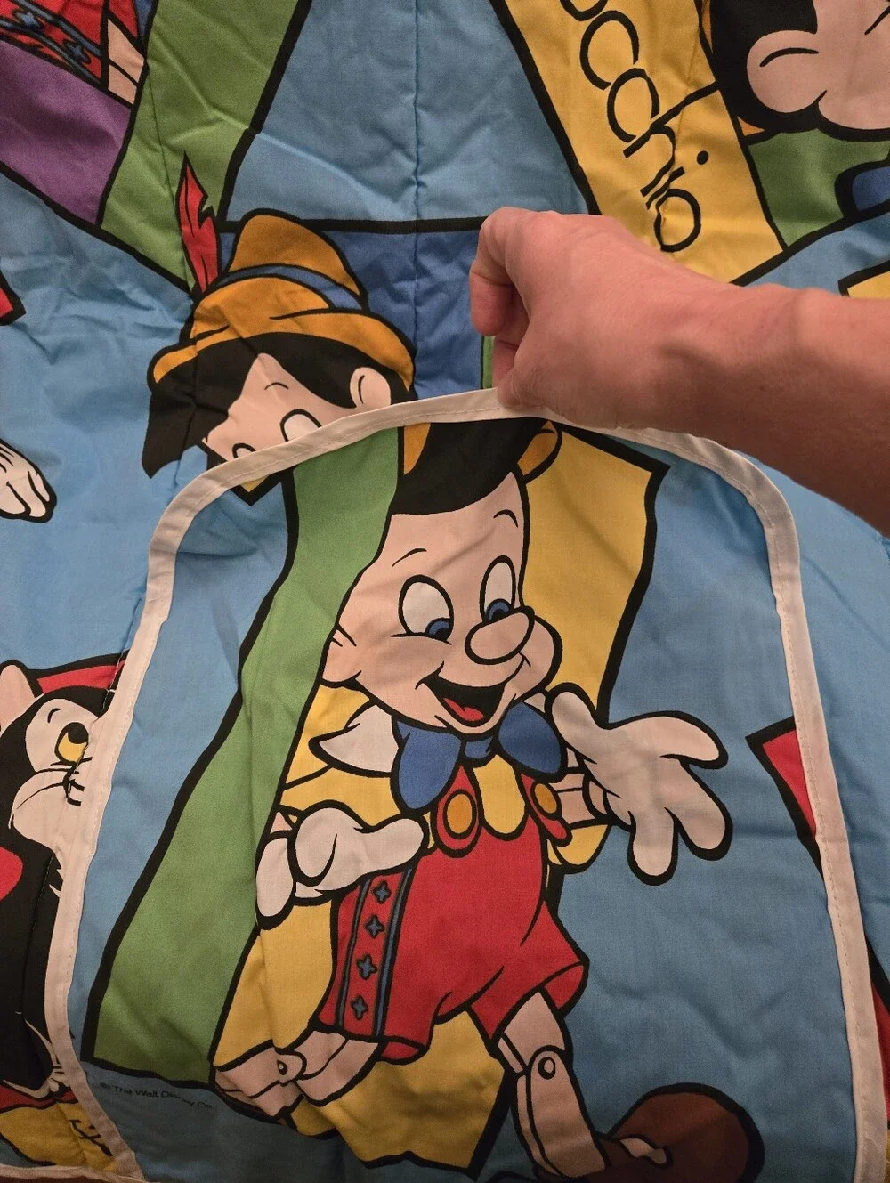 Disney Pinocchio reversible Cuddle Quilt  featuring Figaro the cat.